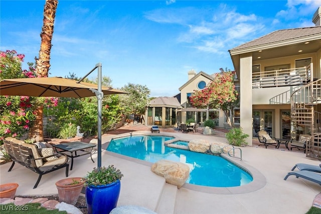3004 Astoria Pines Cir, Las Vegas, NV 89107 - view of pool featuring french doors, a patio area, and a pool with connected hot tub