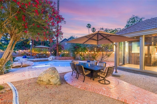 3004 Astoria Pines Cir, Las Vegas, NV 89107 - patio terrace at dusk featuring a patio and outdoor dining space