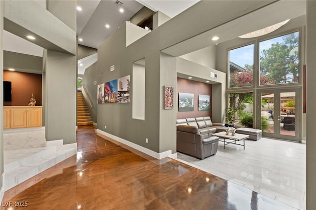 3004 Astoria Pines Cir, Las Vegas, NV 89107 - community lobby featuring a towering ceiling, recessed lighting, and stairway