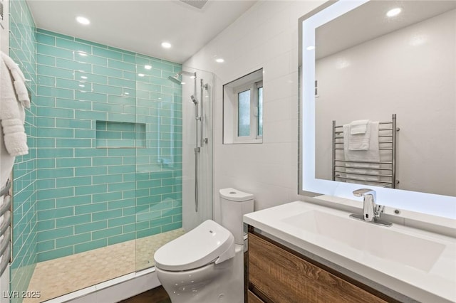 3004 Astoria Pines Cir, Las Vegas, NV 89107 - bathroom with radiator, vanity, a towel warming rack, a tile shower, and baseboard heating