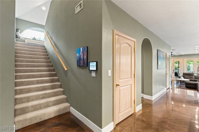 3004 Astoria Pines Cir, Las Vegas, NV 89107 - stairs with baseboards and arched walkways