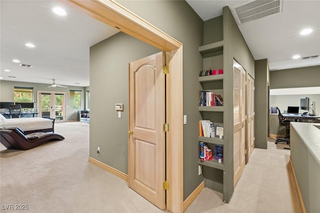 3004 Astoria Pines Cir, Las Vegas, NV 89107 - hall with light colored carpet, an office area, recessed lighting, and french doors