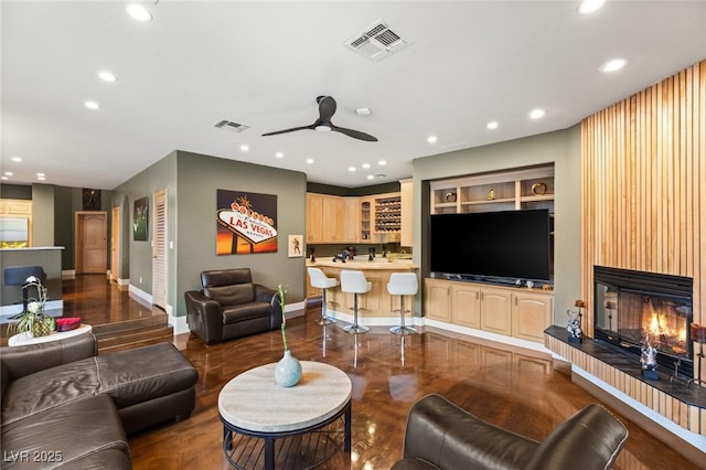 3004 Astoria Pines Cir, Las Vegas, NV 89107 - living room with recessed lighting, ceiling fan, and a fireplace