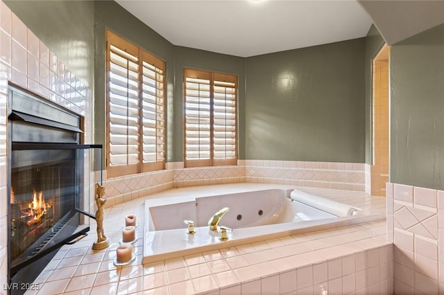 3004 Astoria Pines Cir, Las Vegas, NV 89107 - bathroom featuring a fireplace and a whirlpool tub