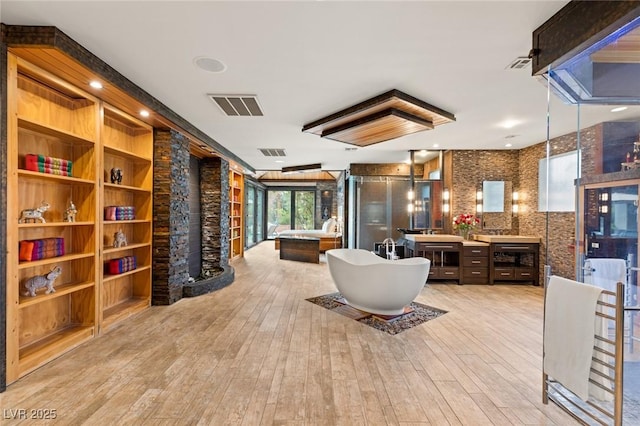 3004 Astoria Pines Cir, Las Vegas, NV 89107 - living area with light wood-type flooring