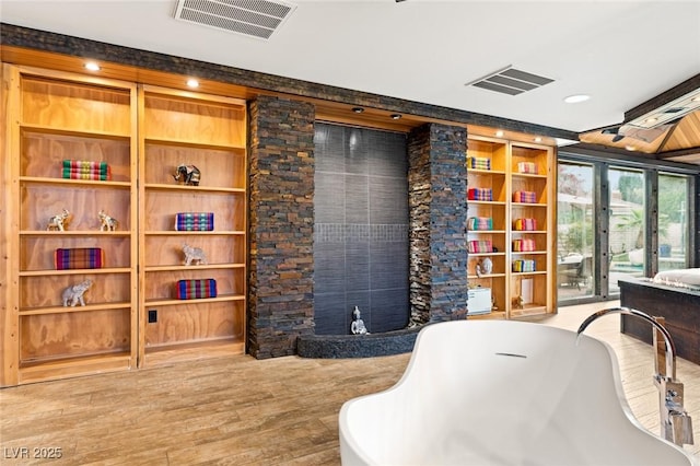 3004 Astoria Pines Cir, Las Vegas, NV 89107 - living area featuring wood finished floors and recessed lighting
