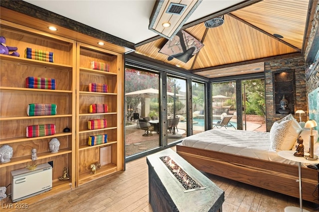 3004 Astoria Pines Cir, Las Vegas, NV 89107 - bedroom with access to exterior and wood-type flooring