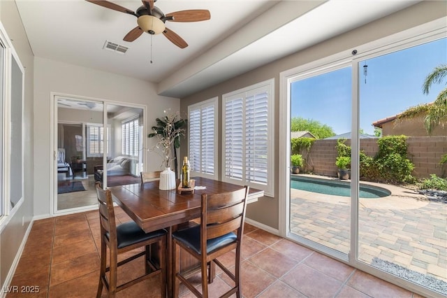 7914 Elk Mountain St, Las Vegas, NV 89113 - dining area with tile patterned flooring and a ceiling fan