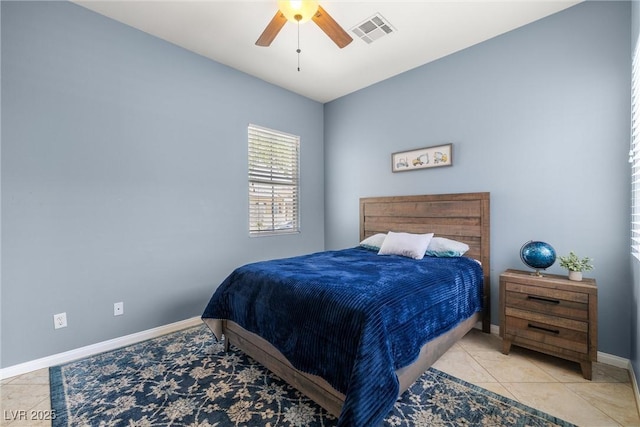 7914 Elk Mountain St, Las Vegas, NV 89113 - tiled bedroom featuring baseboards and ceiling fan