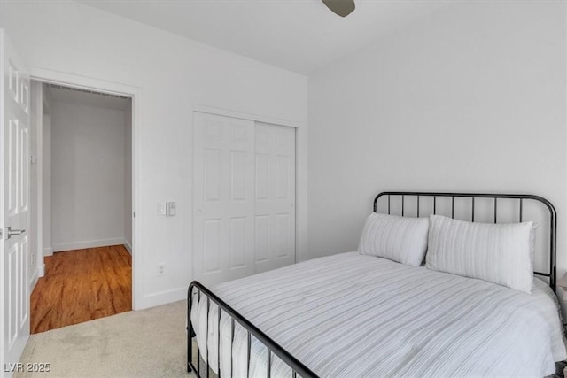 11253 Revelry Ln, Las Vegas, NV 89138 - carpeted bedroom with a closet and a ceiling fan