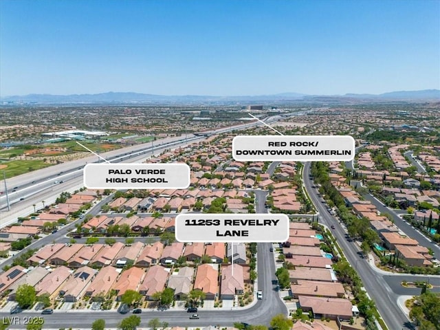 11253 Revelry Ln, Las Vegas, NV 89138 - aerial perspective of suburban area with mountains