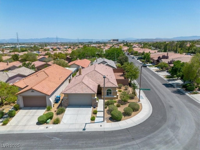 11253 Revelry Ln, Las Vegas, NV 89138 - aerial view of residential area featuring a mountainous background
