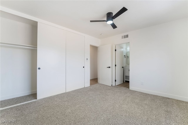 3309 Marionette Ave, Las Vegas, NV 89101 - unfurnished bedroom with carpet, a closet, ensuite bath, and a ceiling fan