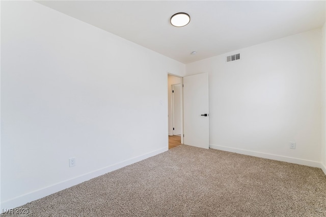 3309 Marionette Ave, Las Vegas, NV 89101 - spare room featuring light carpet and baseboards