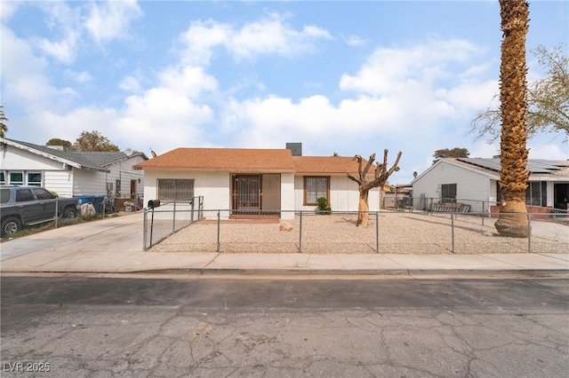 3309 Marionette Ave, Las Vegas, NV 89101 - single story home featuring concrete driveway, an attached garage, stucco siding, and a fenced front yard