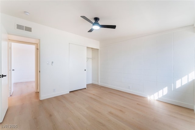 2878 El Cajon St, Las Vegas, NV 89169 - unfurnished bedroom featuring light wood-type flooring, ceiling fan, and a closet