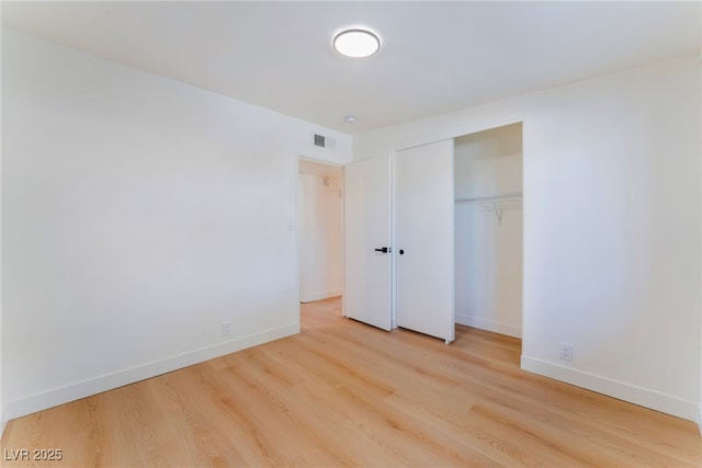 2878 El Cajon St, Las Vegas, NV 89169 - unfurnished bedroom featuring wood finished floors and a closet