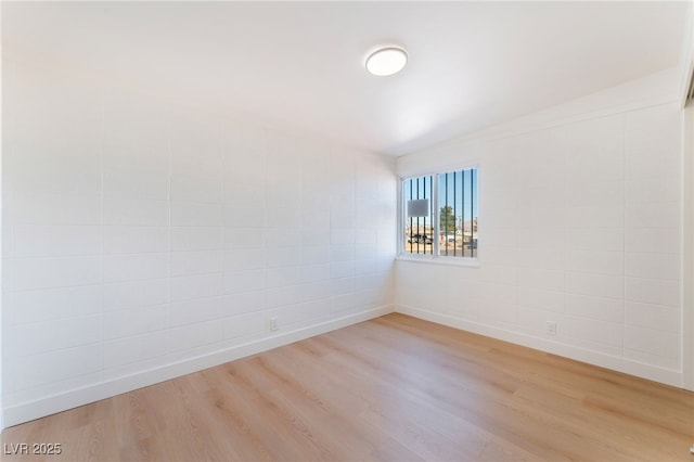 2878 El Cajon St, Las Vegas, NV 89169 - unfurnished room with wood finished floors and baseboards