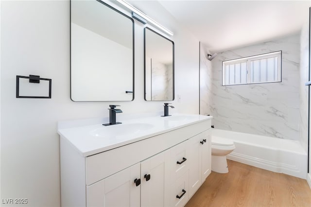 2878 El Cajon St, Las Vegas, NV 89169 - full bath with double vanity, wood finished floors, and tub / shower combination