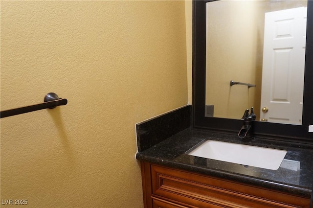2851 S Valley View Blvd Unit 1134, Las Vegas, NV 89102 - bathroom with vanity and a textured wall