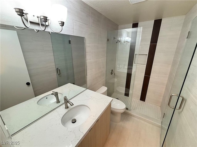 435 Mesa Blvd Unit 202, Mesquite, NV 89027 - bathroom with vanity, a stall shower, wood finished floors, and a chandelier