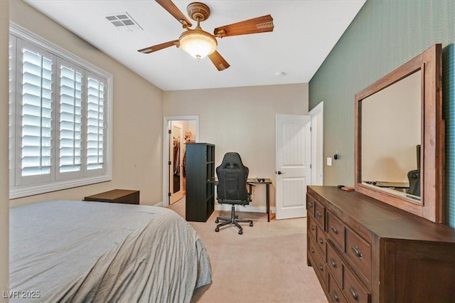 7033 Twin Forks Peak St, Las Vegas, NV 89166 - bedroom featuring light carpet, a desk, and ceiling fan