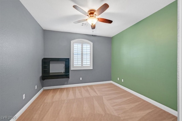 7033 Twin Forks Peak St, Las Vegas, NV 89166 - carpeted empty room with ceiling fan and baseboards