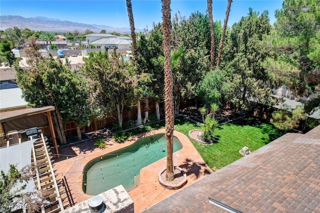 5260 N Jones Blvd, Las Vegas, NV 89130 - view of pool featuring a fenced backyard, a patio, and a mountain view