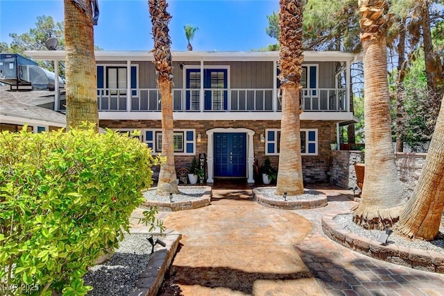 5260 N Jones Blvd, Las Vegas, NV 89130 - view of front of home with stone siding and french doors