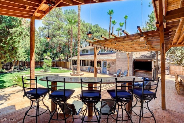 5260 N Jones Blvd, Las Vegas, NV 89130 - fenced backyard with a patio and a pergola
