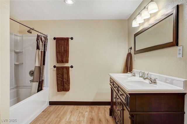 5260 N Jones Blvd, Las Vegas, NV 89130 - full bathroom with wood finished floors, double vanity, and shower / tub combo with curtain
