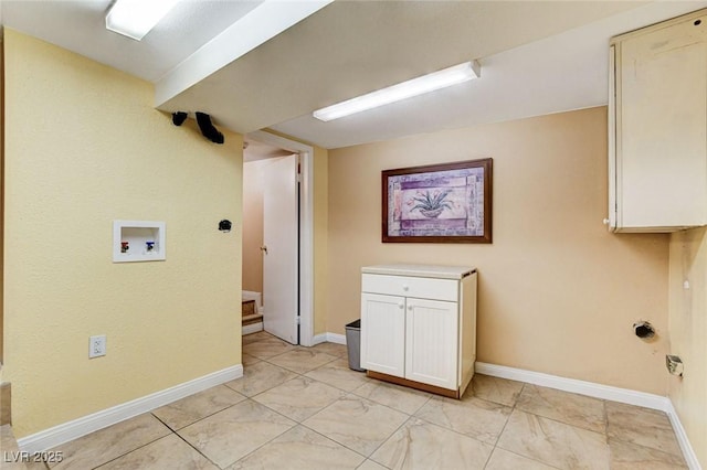 5260 N Jones Blvd, Las Vegas, NV 89130 - laundry room with hookup for a washing machine and cabinet space