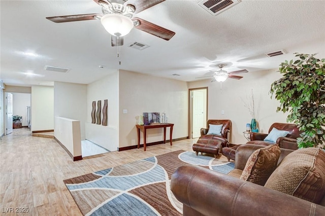 5260 N Jones Blvd, Las Vegas, NV 89130 - living area featuring a ceiling fan and light wood-type flooring