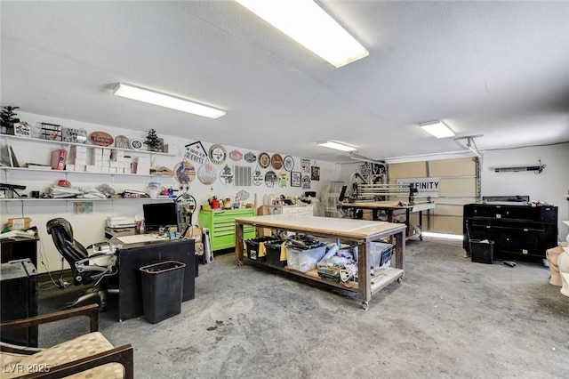 5260 N Jones Blvd, Las Vegas, NV 89130 - garage featuring a workshop area and an office area