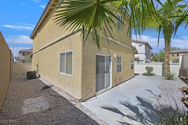 1109 Claire Rose Ave, Las Vegas, NV 89183 - view of home's exterior with stucco siding, a patio, and a fenced backyard