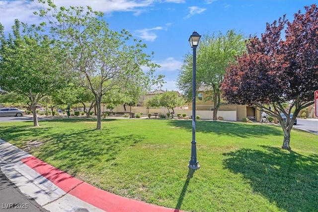 1109 Claire Rose Ave, Las Vegas, NV 89183 - surrounding community with a lawn
