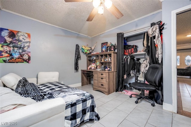 224 Catalini St, Las Vegas, NV 89107 - bedroom featuring ornamental molding, a textured ceiling, light tile patterned floors, a closet, and ceiling fan