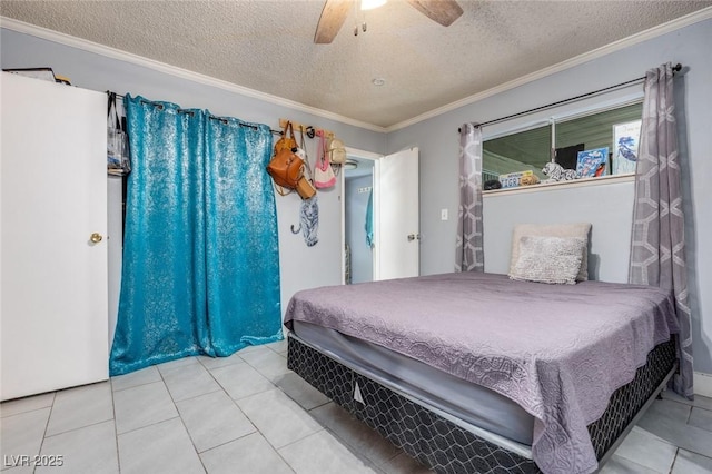 224 Catalini St, Las Vegas, NV 89107 - bedroom with a textured ceiling, tile patterned floors, ornamental molding, and a ceiling fan
