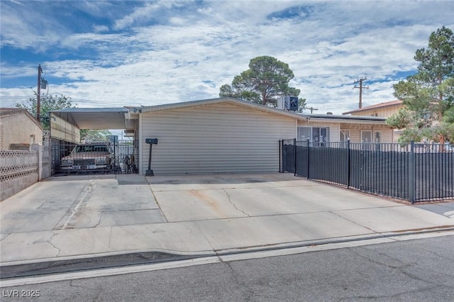 224 Catalini St, Las Vegas, NV 89107 - view of front of property featuring a gate and a carport