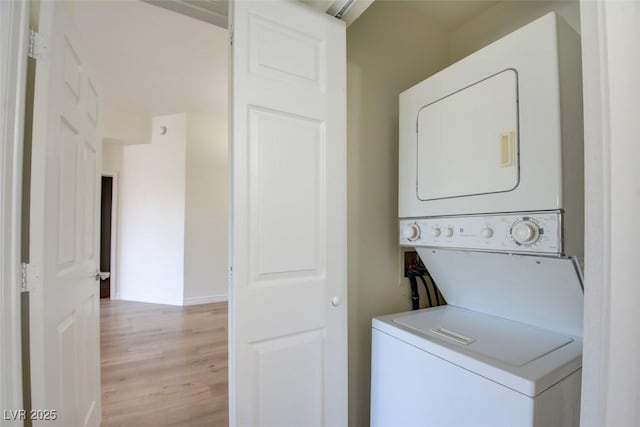 23 E Agate Ave Unit 207, Las Vegas, NV 89123 - laundry area with estacked washer and dryer and light wood-style floors