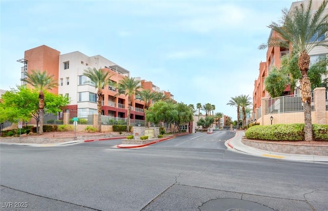 23 E Agate Ave Unit 207, Las Vegas, NV 89123 - view of asphalt road with curbs and sidewalks