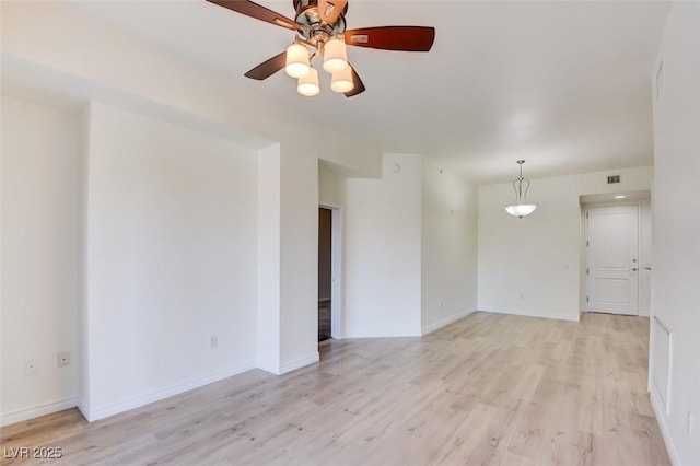 23 E Agate Ave Unit 207, Las Vegas, NV 89123 - spare room with light wood-style flooring and ceiling fan