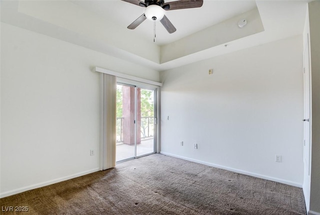 23 E Agate Ave Unit 207, Las Vegas, NV 89123 - carpeted empty room featuring a tray ceiling and ceiling fan