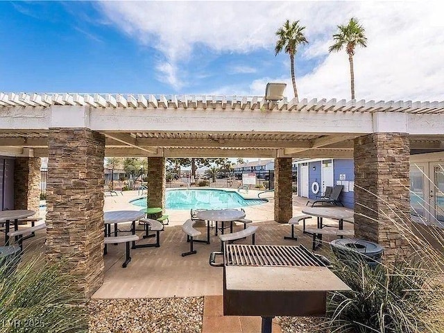 5420 Centurion Ct Unit 104, Las Vegas, NV 89122 - view of patio with a community pool