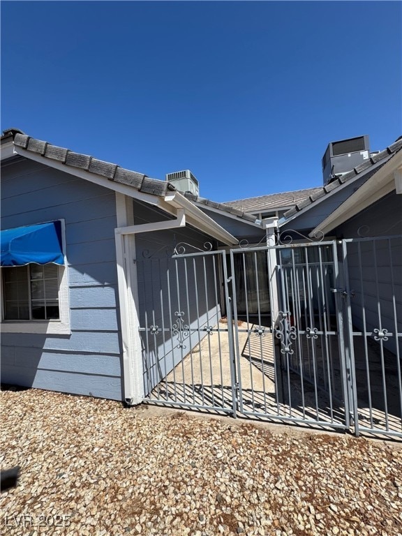 5420 Centurion Ct Unit 104, Las Vegas, NV 89122 - view of side of home with a gate