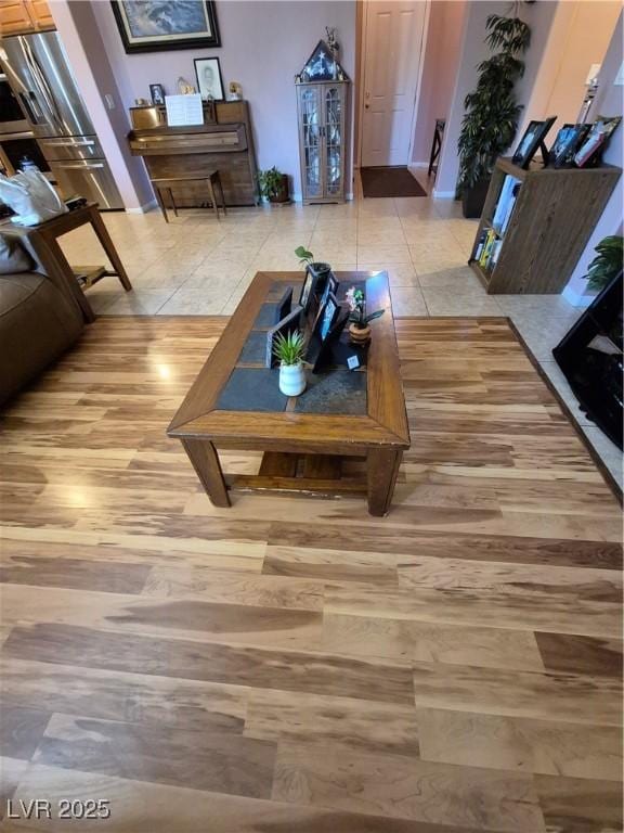 6009 Arbor Crest St, North Las Vegas, NV 89081 - living room with light tile patterned floors and baseboards