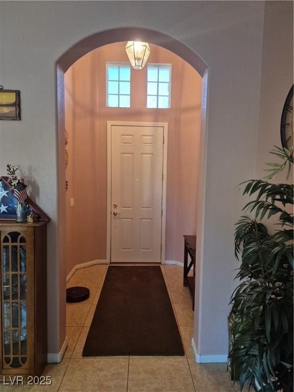 6009 Arbor Crest St, North Las Vegas, NV 89081 - tiled foyer featuring arched walkways