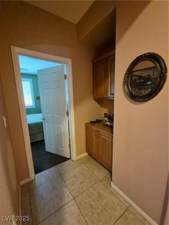 6009 Arbor Crest St, North Las Vegas, NV 89081 - corridor featuring light tile patterned flooring