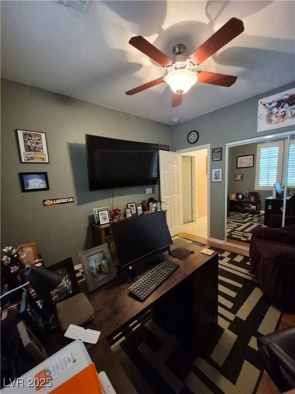 6009 Arbor Crest St, North Las Vegas, NV 89081 - living room with an office area, ceiling fan, and wood finished floors