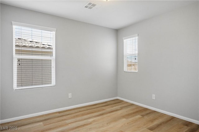 9136 Cocowoods Pl, Las Vegas, NV 89148 - empty room featuring light wood-style flooring and baseboards